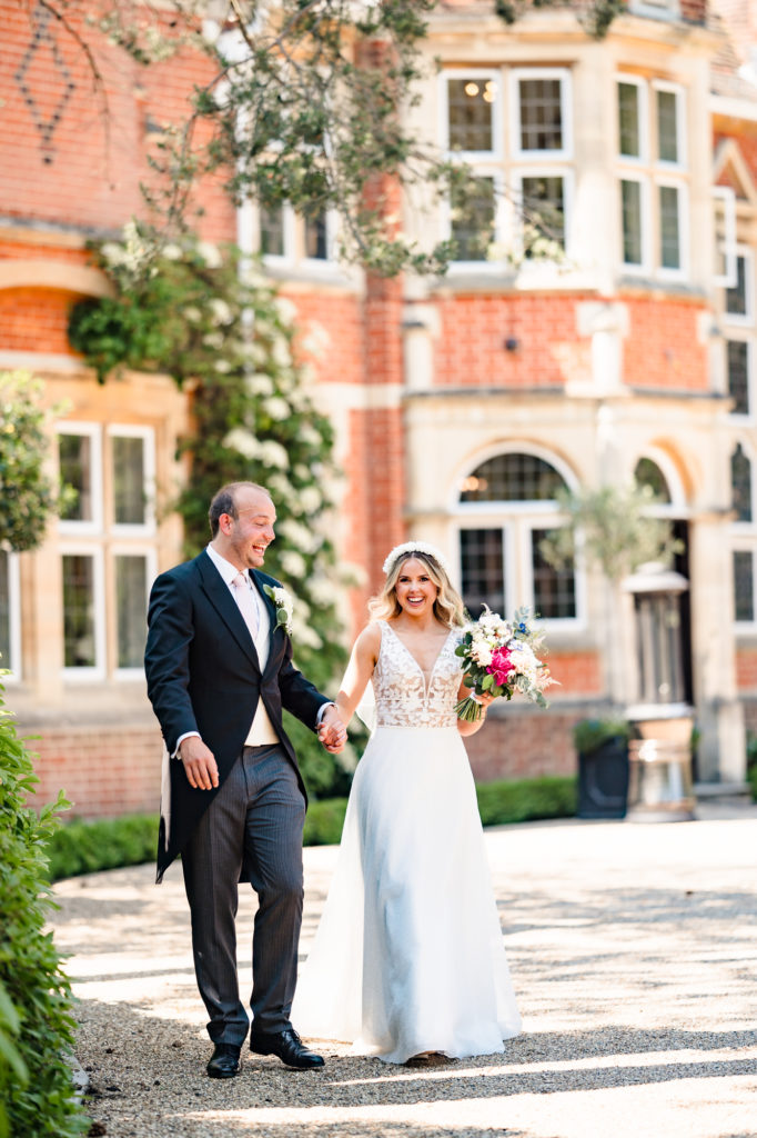 Bride & Groom in front of Baddow Park House in Essex